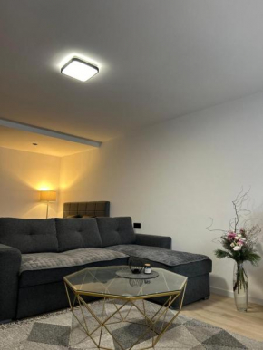 J Apartments